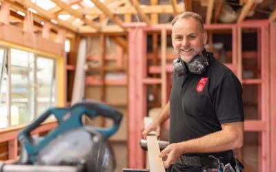 nzcb member working on roof battens with mitre saw set up